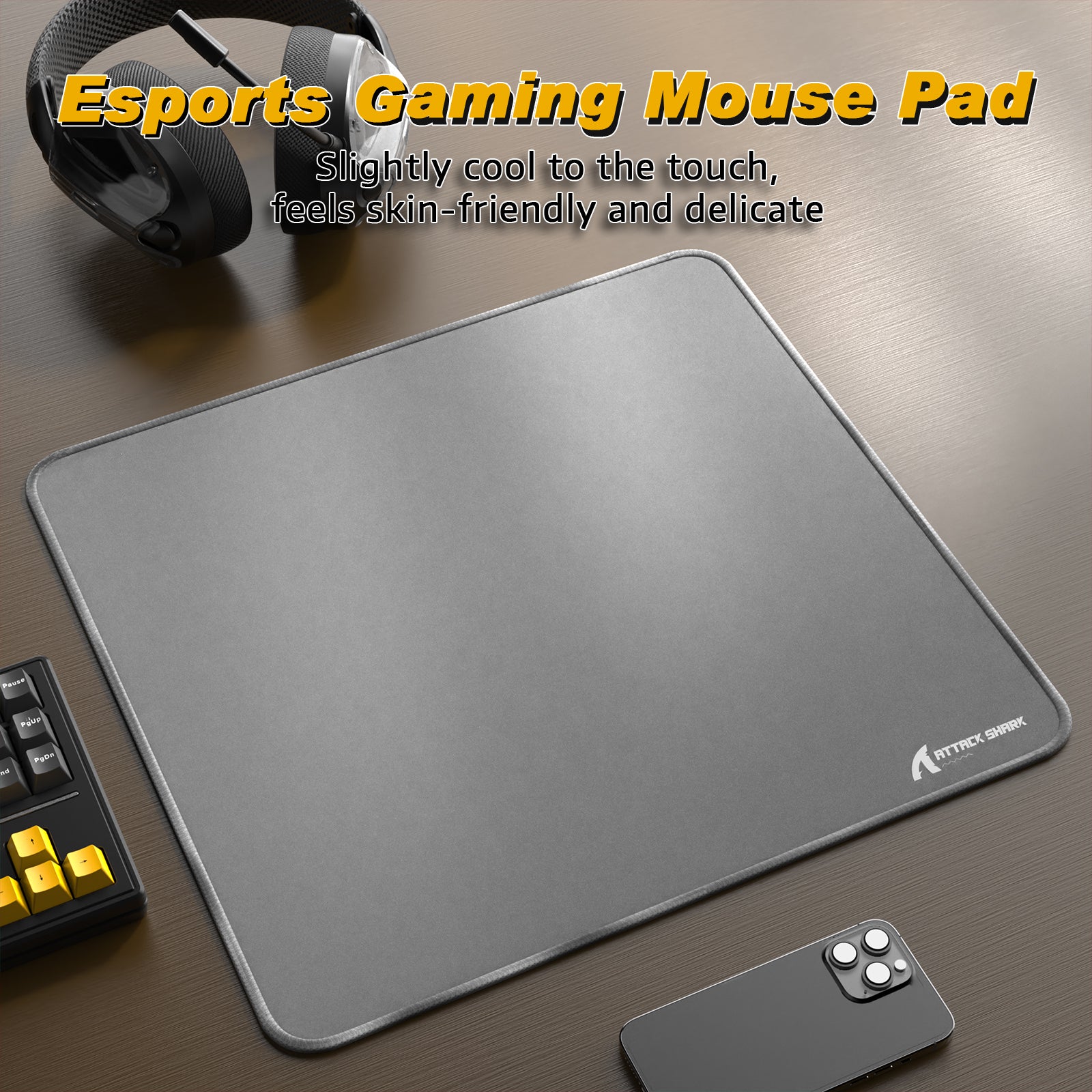 ATTACK SHARK CM02 Esports Gaming Mouse Pad with gray surface, esports design with text, headset, and keyboard setup.