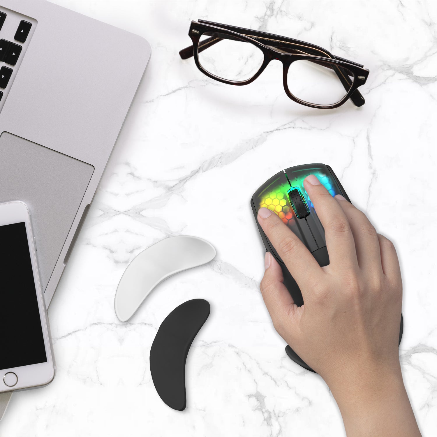ATTACK SHARK mouse wrist rest with ergonomic support, showcased with gaming mouse, phone and glasses on marble background.