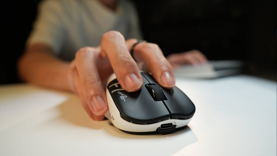Attack Shark F1 Air wireless gaming mouse in hand